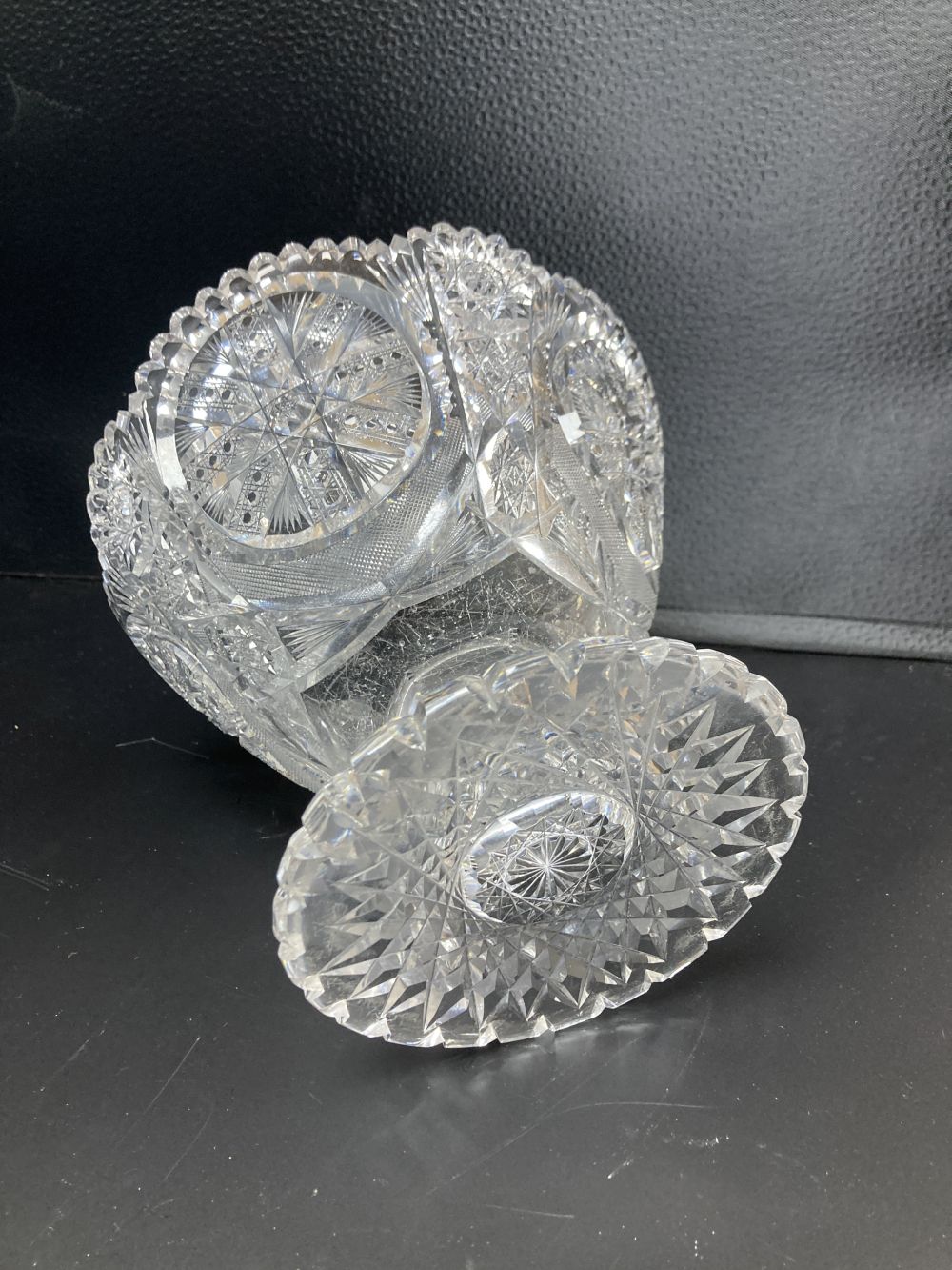An American or Bohemian brilliant cut glass pedestal bowl and large dish, late 19th century, dish 36cm